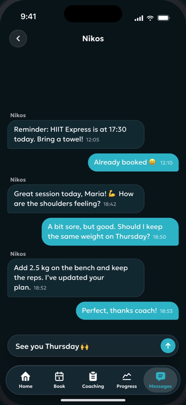 A member chatting with their coach
